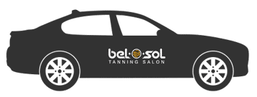 Black sedan with BelSol Tanning Salon advertisement.
