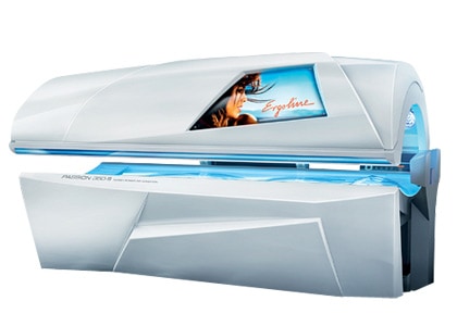 Modern indoor tanning bed with open lid and UV lights.